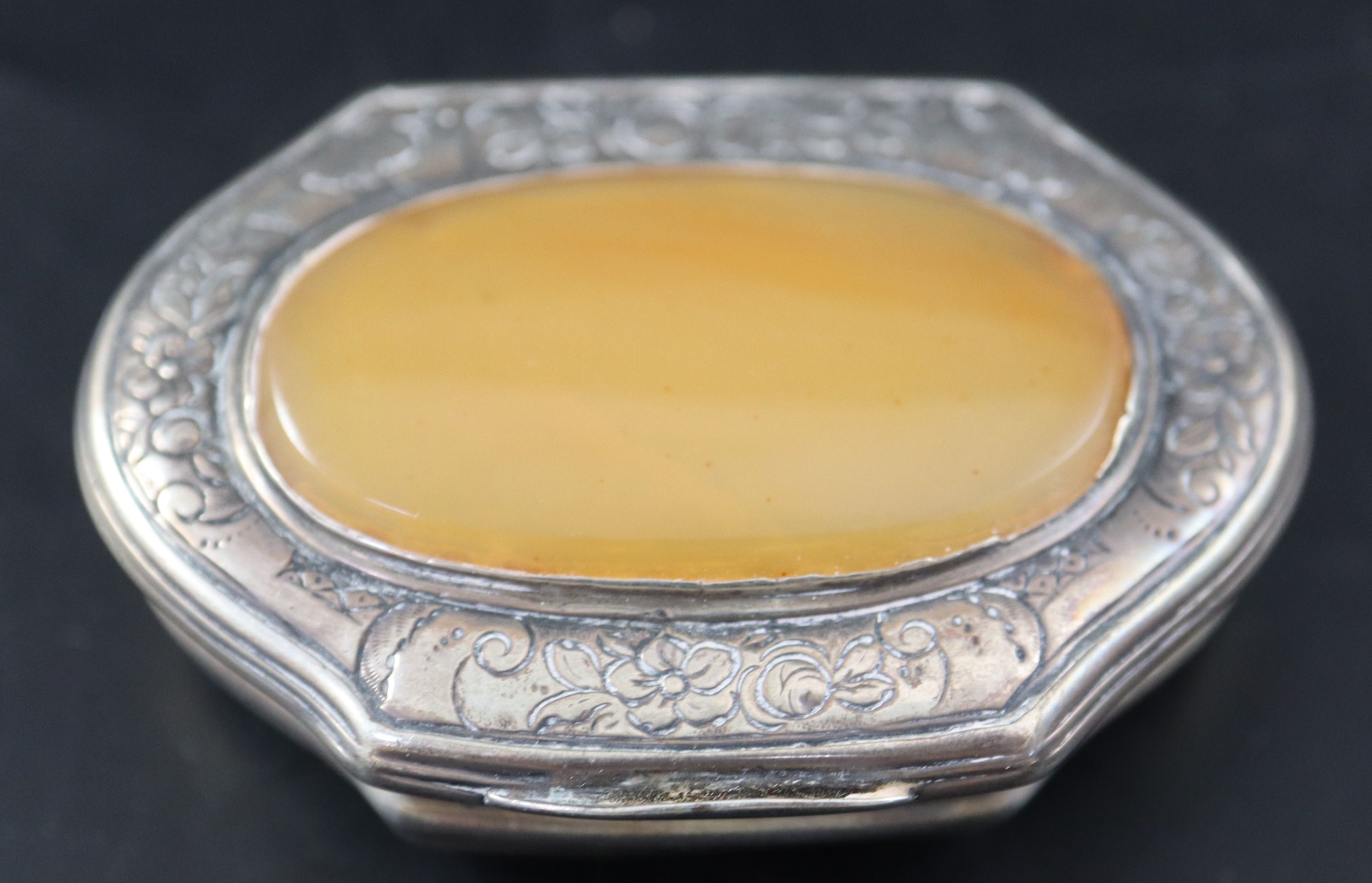 A 19th century Continental engraved white metal snuff box, 57mm, gross 31 grams.